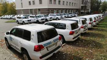Три автомобиля миссии ОБСЕ выехали с территории гостиницы в центре Донецка