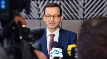 Польша готова финансировать возвращение мигрантов на родину, заявил премьер