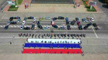 В ЛНР прошел автомотопробег в честь Дня российского флага