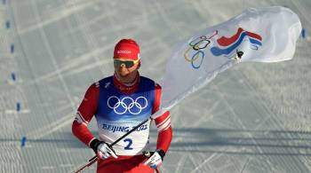 Появилось видео триумфального финиша Большунова с флагом в скиатлоне
