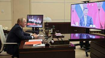 Ушаков назвал разговор Путина и Си Цзиньпина беседой двух друзей