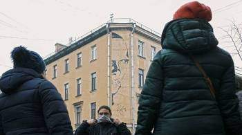 Световая проекция заменит граффити с  Хармсом на фасаде дома в Петербурге