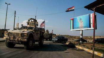 Сирийцы закидали американские бронемашины камнями и сожгли флаги США