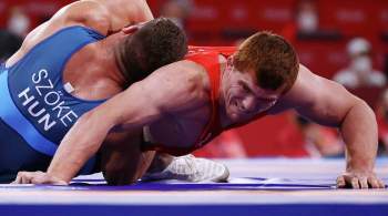 Борец Евлоев принес России 13-е золото на Олимпиаде
