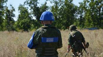 Украинские силовики размещают бронетехнику в жилых районах, заявили в ЛНР
