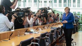 У российского журналиста отозвали аккредитацию на заседание с Меркель