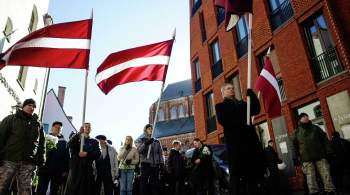 На флаге молодежного отряда Нацгвардии Латвии обнаружили свастику
